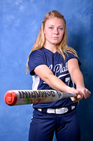 High school senior swinging baseball bat during studio session at Lawanda King Photography