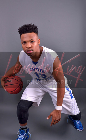 Graduating athlete with basketball at Capitol Christian Academy