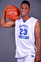 Graduating athlete with basketball at Capitol Christian Academy