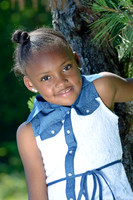 Outdoor session in tree with little girl in Prince George's County