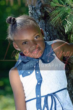 Outdoor session in tree with little girl in Prince George's County