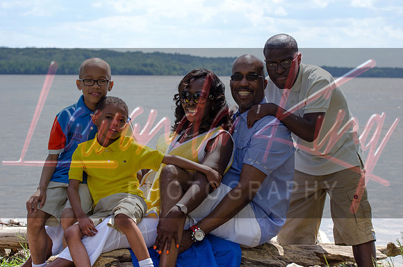 Outdoor family session by water at Prince George's County park