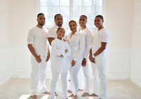 Indoor lifestyle family portrait with natural window light in Charles County MD