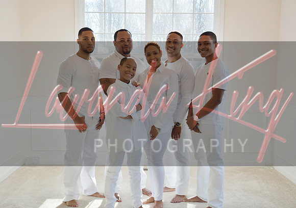 Indoor lifestyle family portrait with natural window light in Charles County MD
