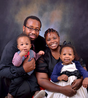 Family portrait of parents with infant toddler children at Lawanda King Photography studio