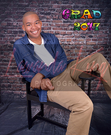 High school senior with brick background at Lawanda King Photography studio