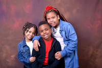 Red abstract background children portrait session at Lawanda King Photography studio