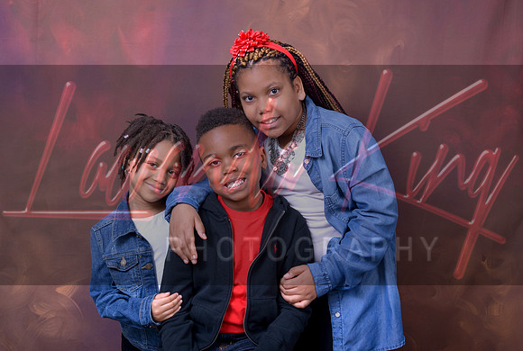 Red abstract background children portrait session at Lawanda King Photography studio