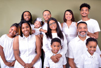 Three-generation family photo with grandparents, children and grandkids