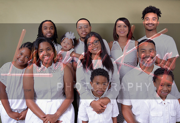 Three-generation family photo with grandparents, children and grandkids