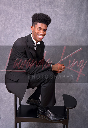 High school senior with tuxedo at Lawanda King Photography studio