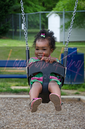 Little girl on swing outdoor session in Waldorf, MD