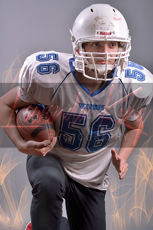 Senior boy in football uniform for sports-themed graduation photo shoot at Capitol Christian Academy