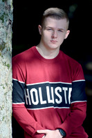 High school graduate flash lighting outdoor session in Charlotte Hall, MD