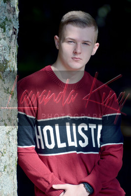 High school graduate flash lighting outdoor session in Charlotte Hall, MD