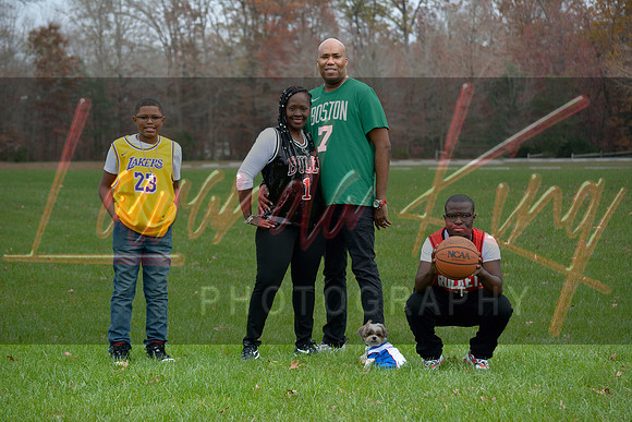 Outdoor family photo in open field in White Plains, MD