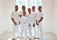 Family all white attire at home session with Lawanda King Photography